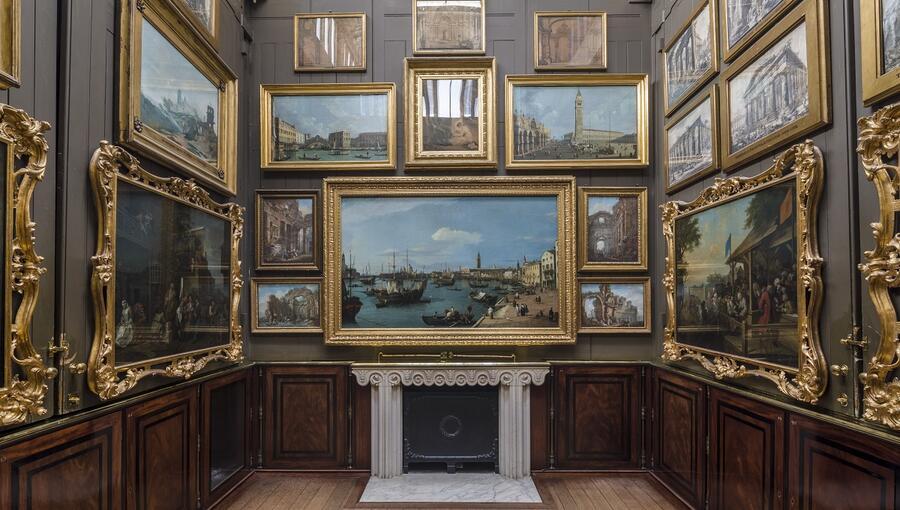 The east wall of the Picture Room at the Museum, focused primarily on a large gold-framed Canaletto view of Venice.