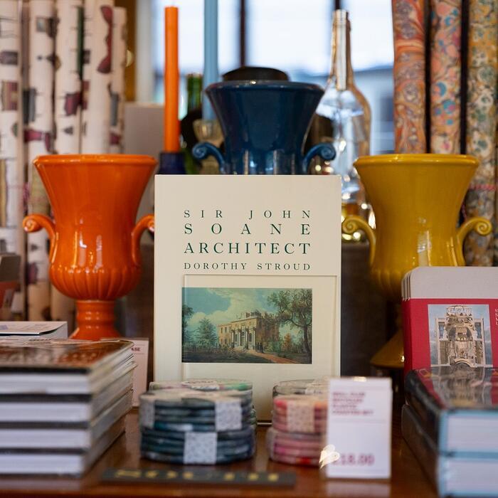 A selection of gifts, books, treats, models and stationery arranged in the Soane shop.
