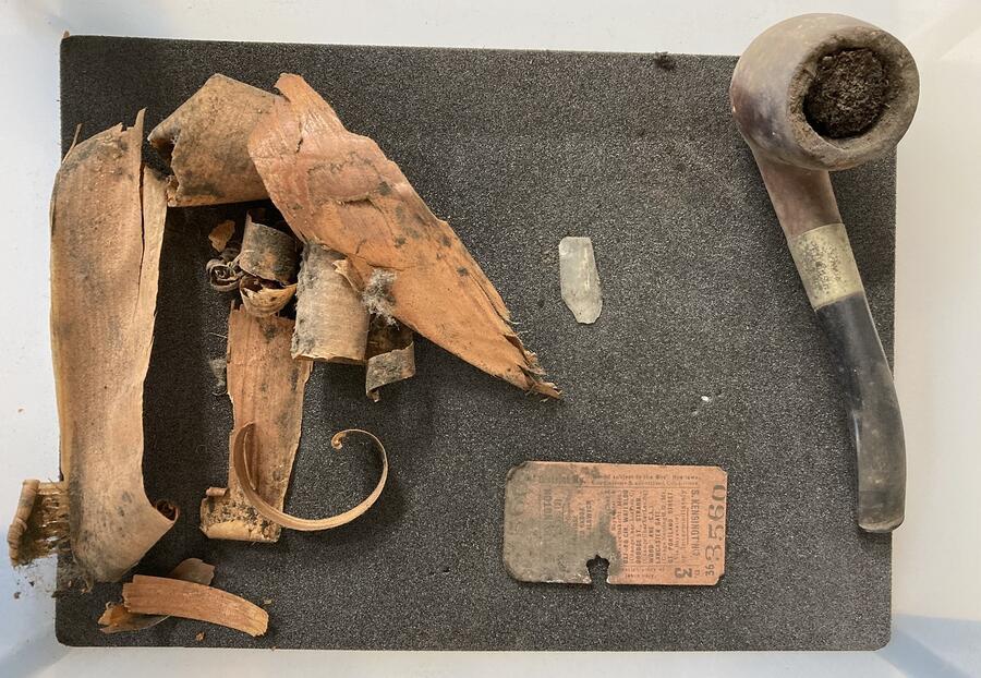 The cleaned items of the time capsule, in the Museum's conservation studio.